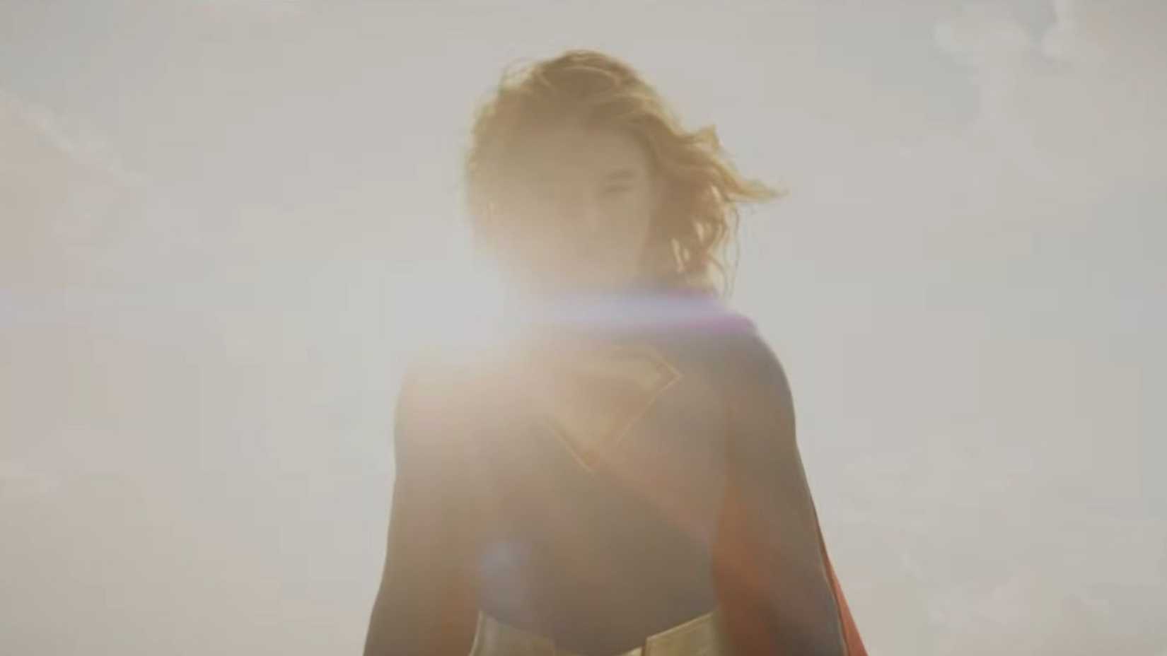 Supergirl framed in light