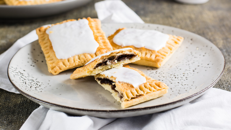 Three homemade Pop-Tarts on a white plate