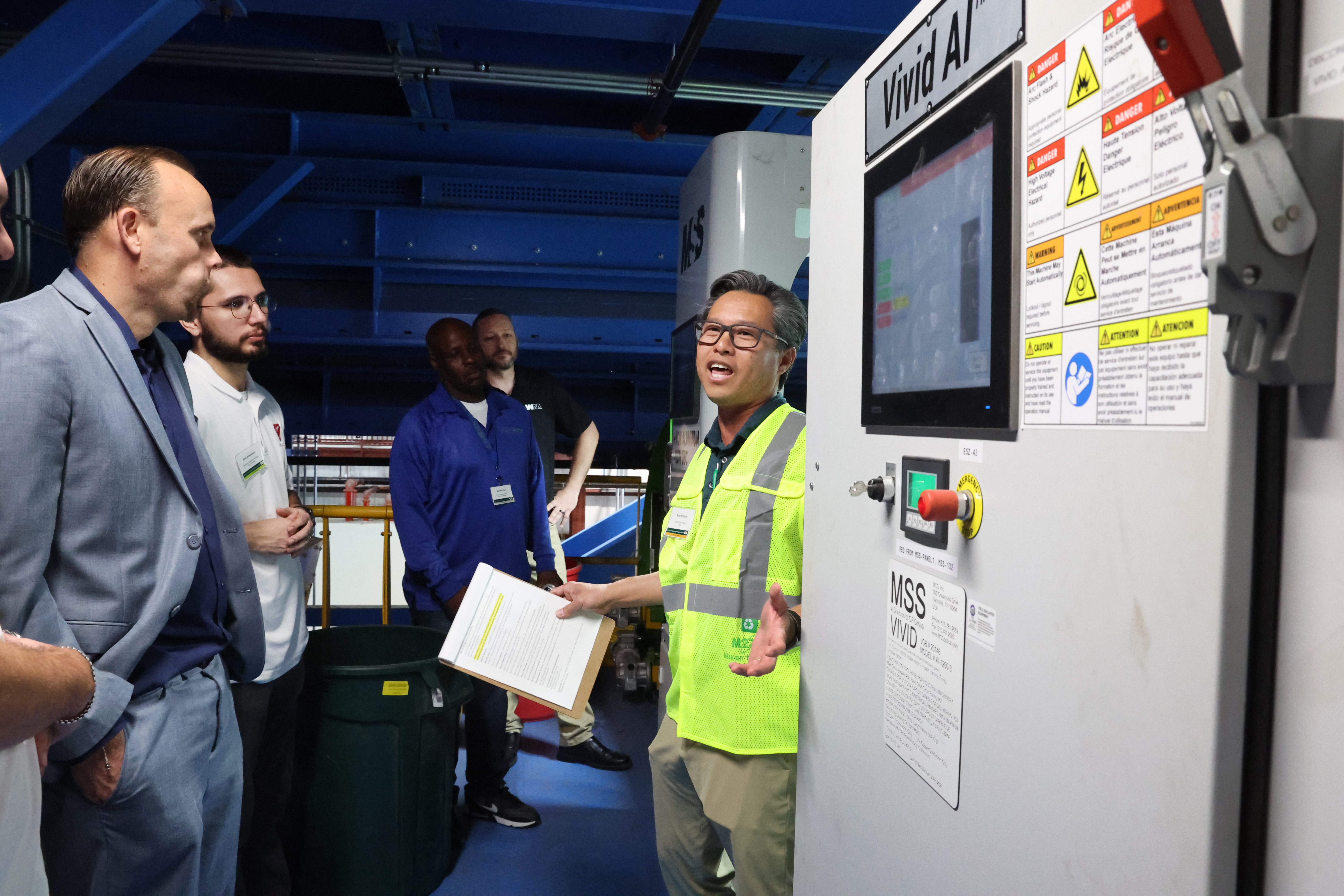 Sean Williams, sales and project manager with Waste Management, leads...