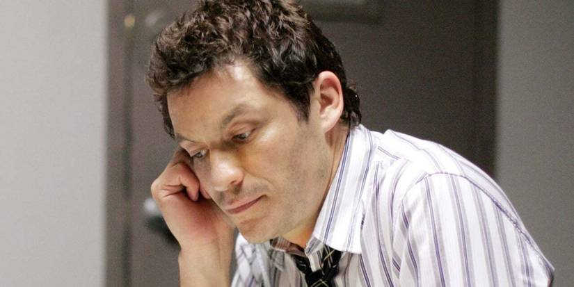 Dominic West as Jimmy McNulty looking down and thinking in The Wire.