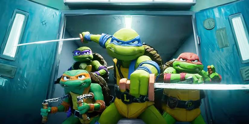 The Teenage Mutant Ninja Turtles standing together, holding their weapons, and ready for combat in TMNT: Mutant Mayhem