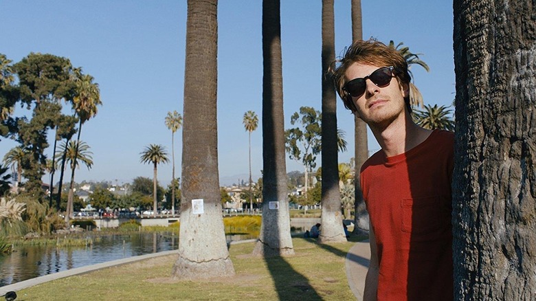 Andrew Garfield as Sam, following a lead in Under the Silver Lake