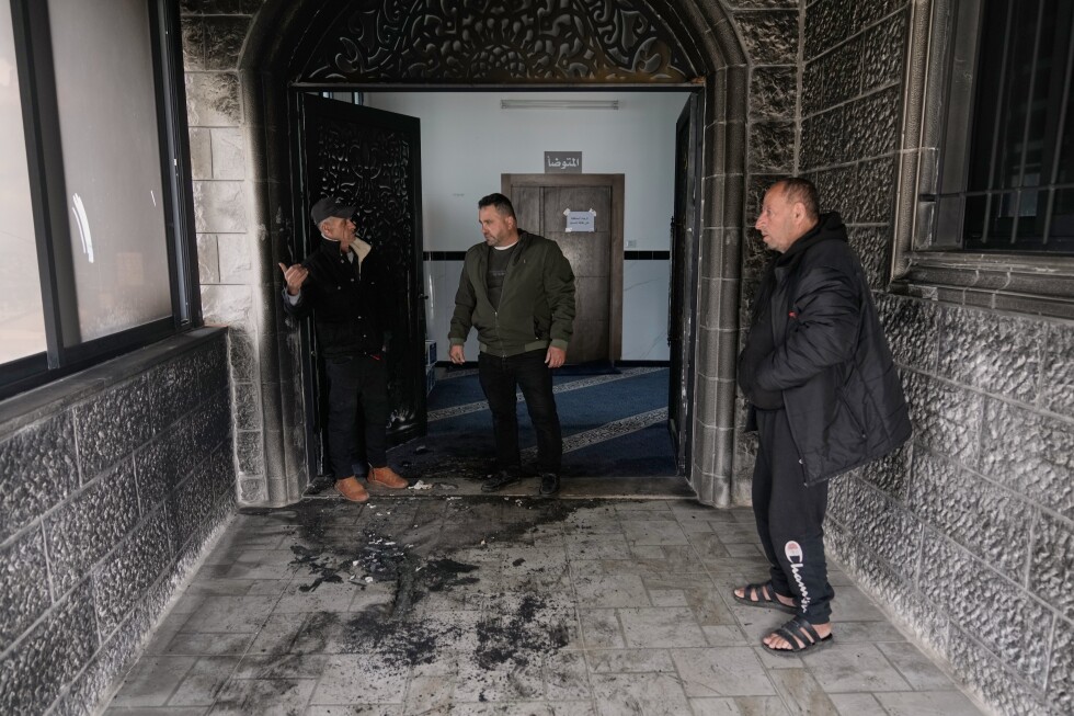 Israeli settlers burn a mosque in the West Bank during Ramadan