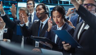 A group of stock traders on a trading floor.
