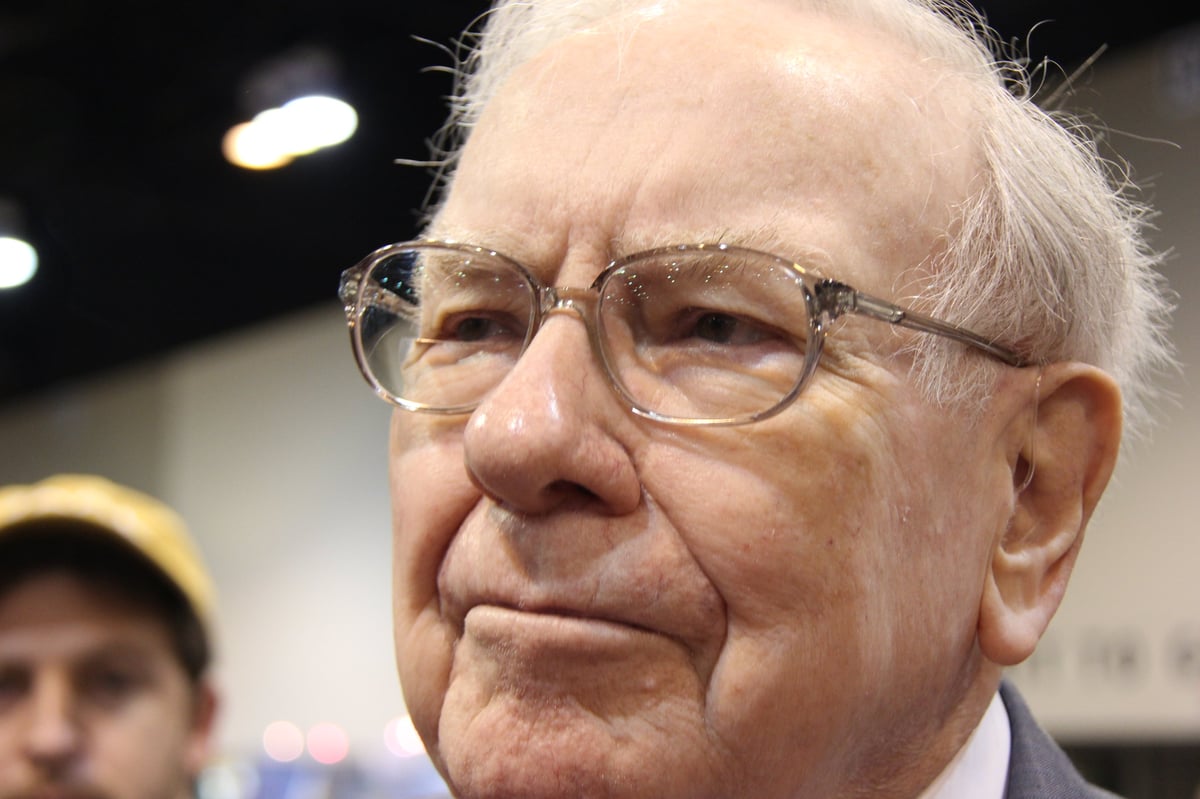 Warren Buffett is shown in close-up.