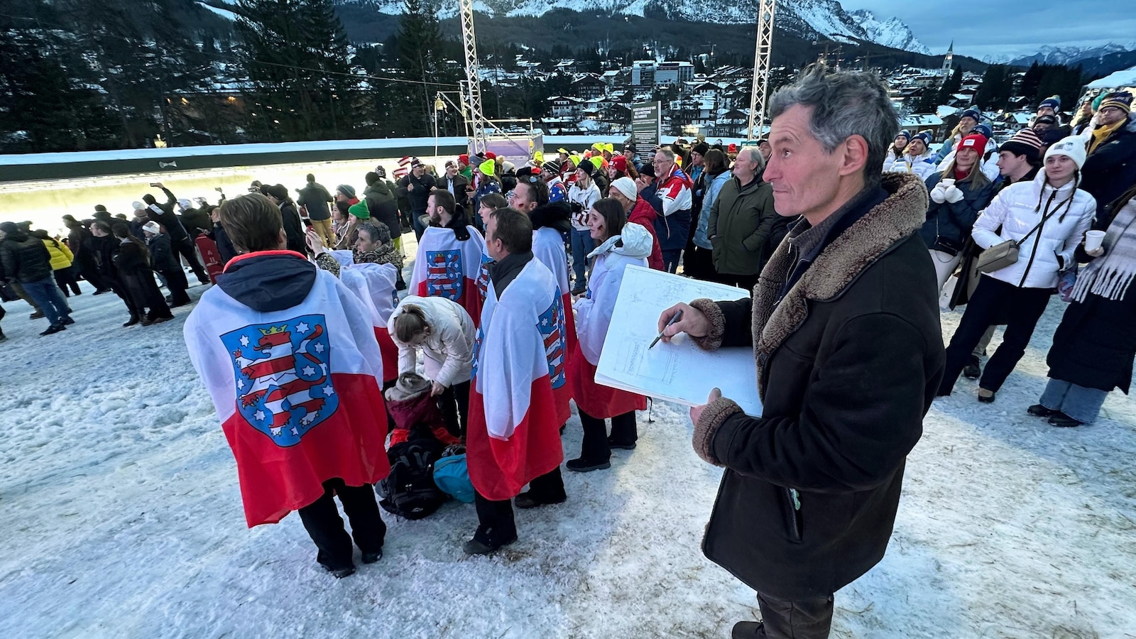 French artist finds happiness drawing spectators at his 17th Olympics in Cortina
