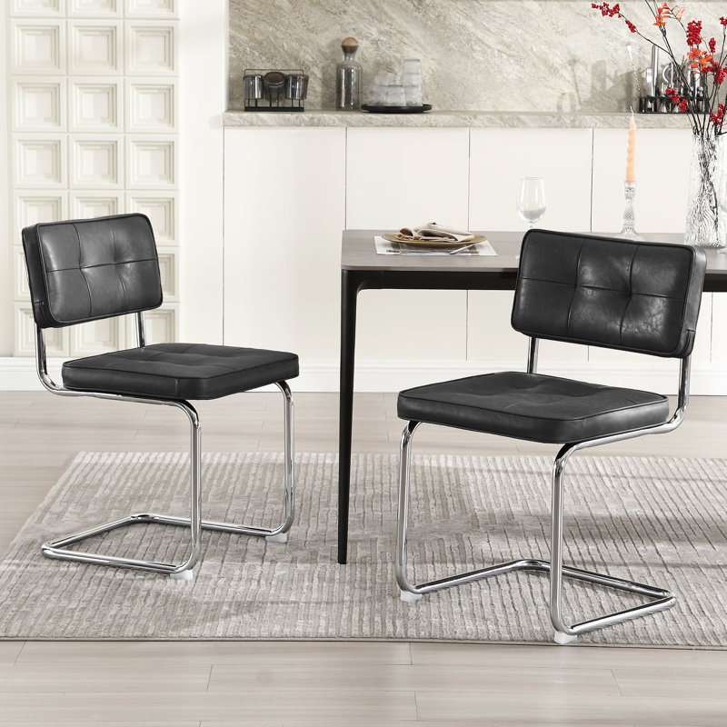 Corrigan Studio&reg; Aveon 19.3" H Mid Century Modern Tufted Leather Side Dining Chair With Steel Frame &amp; Reviews | Wayfair