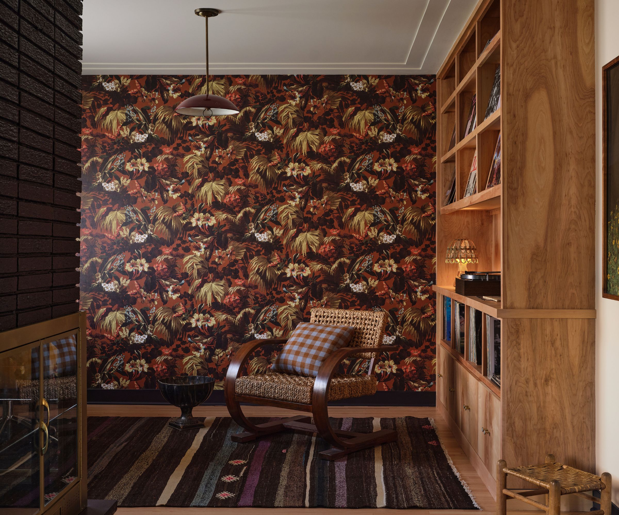 Music nook with House of Hackney wallpaper, shelving and a vinyl deck