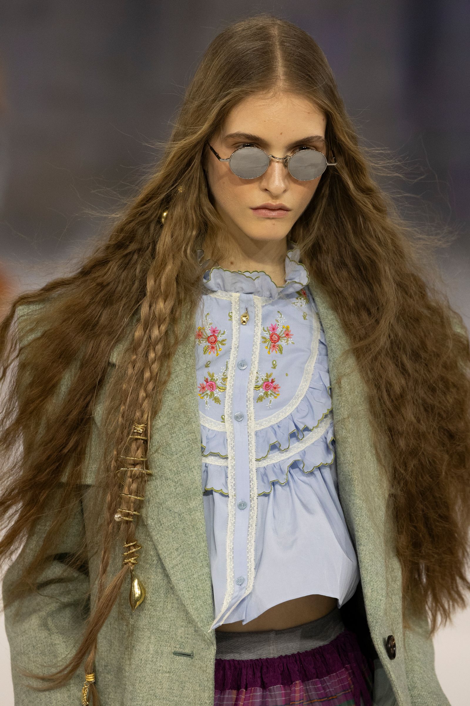 Image may contain Brown Hair Hair Person Teen Braid Clothing and Coat