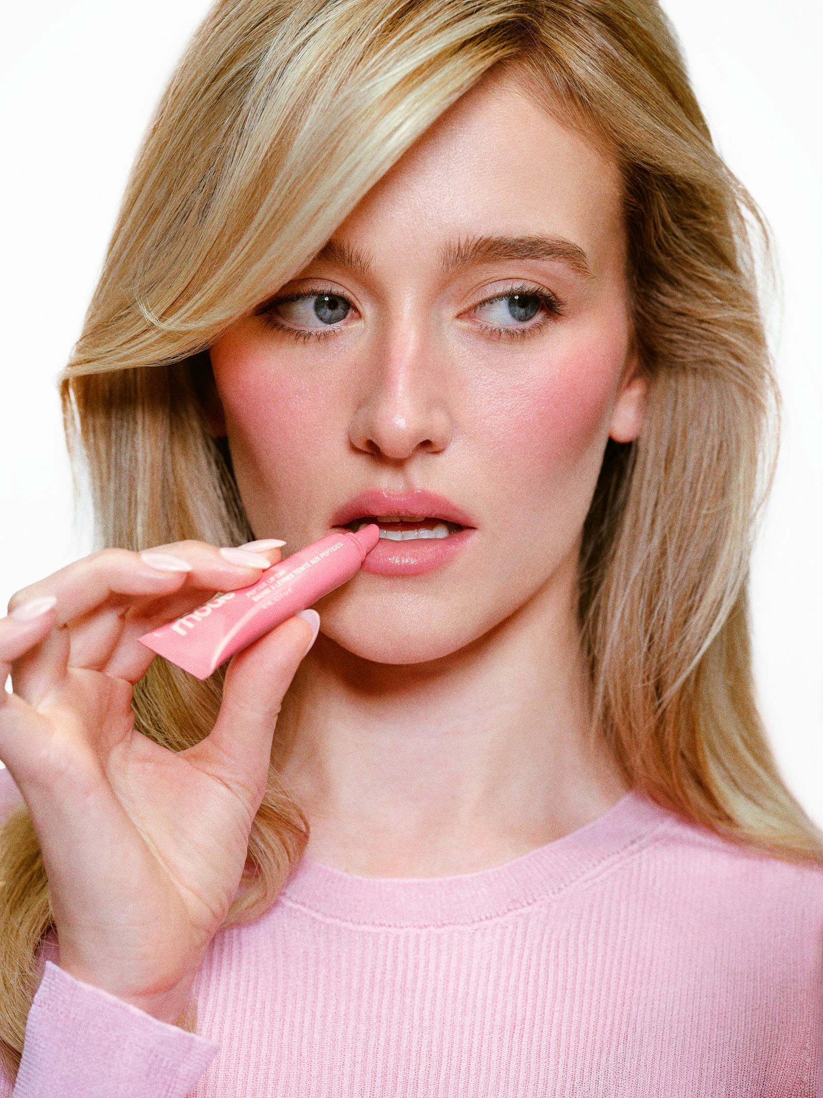 Image may contain Cosmetics Lipstick Head Person and Face