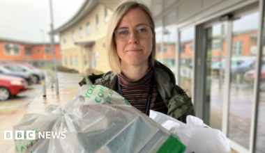Dr Georgie Kirby is carrying a delivery of waste medicine collected through the 'Show Me Your Meds' campaign.