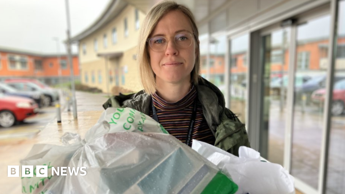 Dr Georgie Kirby is carrying a delivery of waste medicine collected through the 'Show Me Your Meds' campaign.