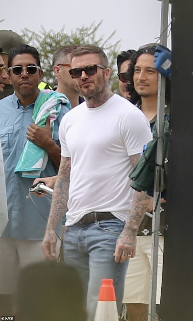 The 27-year-old influencer was later seen sunbathing by the hotel's lavish pool at 3pm, just three hours before Sir David, 50, arrived for dinner at the Polo Lounge at 6pm with two friends