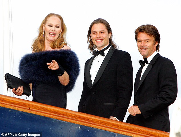 Ursula's most notable relationship was with Harry Hamlin (right, with their son, centre) after the star seduced him and got pregnant that same night. Their son Dimitri was born in 1980