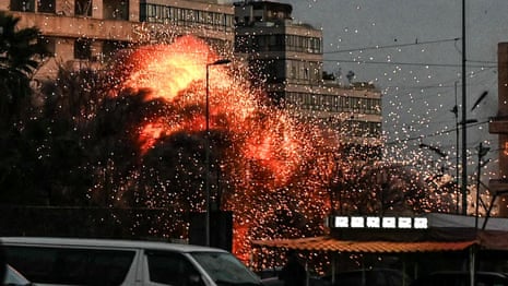 Moment building in central Beirut collapses after Israeli strike – video