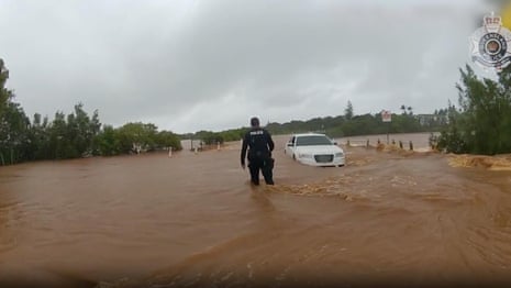 Police rescue people stranded in flood waters near Bundaberg, Queensland – video
