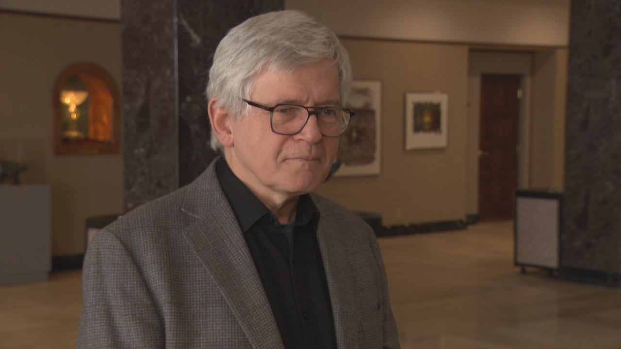 Man in glasses wearing suit