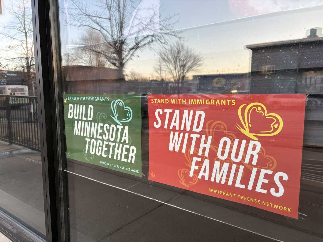 Stores in Minneapolis have posted signs supporting immigrants in the community, attempting to bar federal agents from entering.