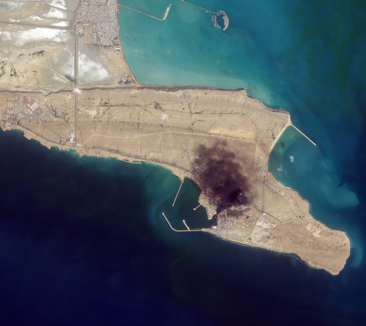 Satellite imagery of a strike on a military base.