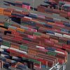 Cargo containers are staged near cranes at the Port of Tacoma in Washington.