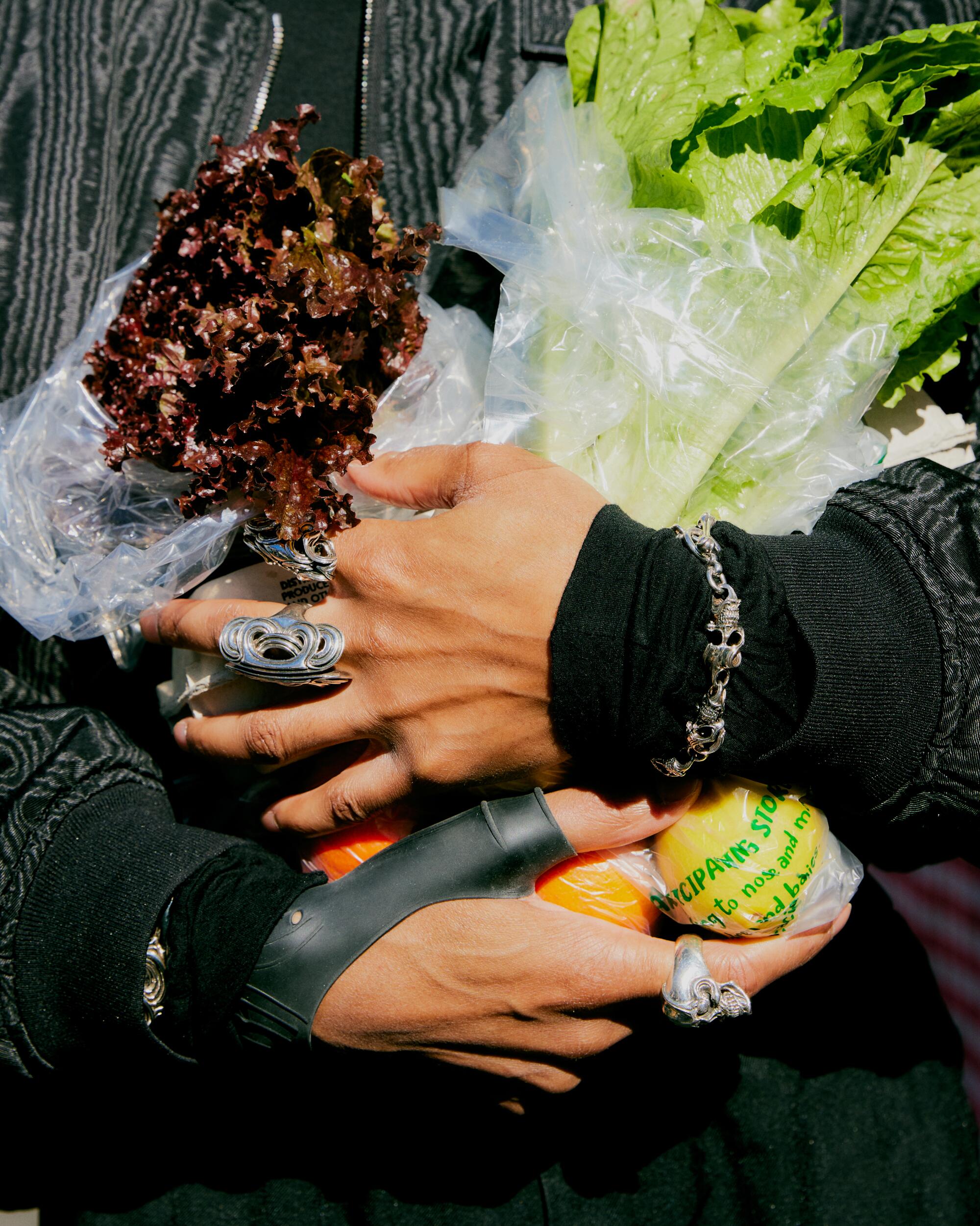 Quincy Vadan wears his personal jewelry designs, under the brand Vadan.