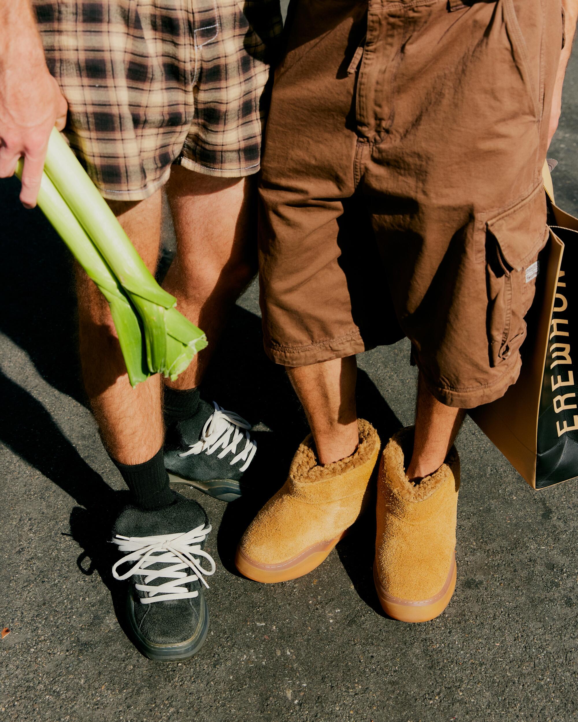 Austin Bachlor wears a Bellagio hat, and polo top, shorts and sneakers. Carlos Bachlor wears vintage top, shorts and boots.
