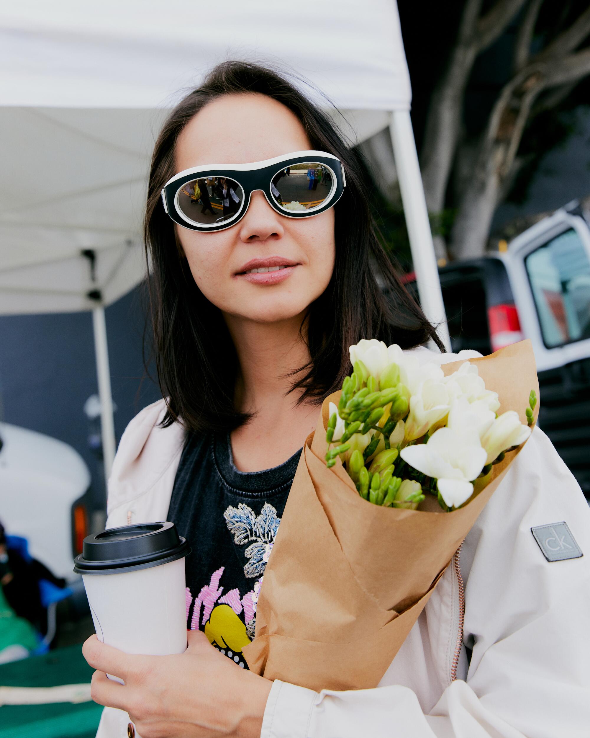 Anastasiia Yermak in mirrored sunglasses.