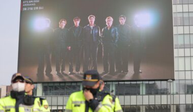 Police officers inspect areas in central Seoul, Wednesday, where BTS  will hold its comeback concert on March 21. Yonhap