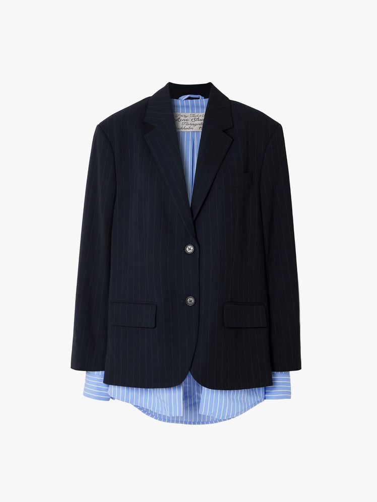 Image may contain: Blazer, Clothing, Coat, Jacket, Formal Wear, and Suit