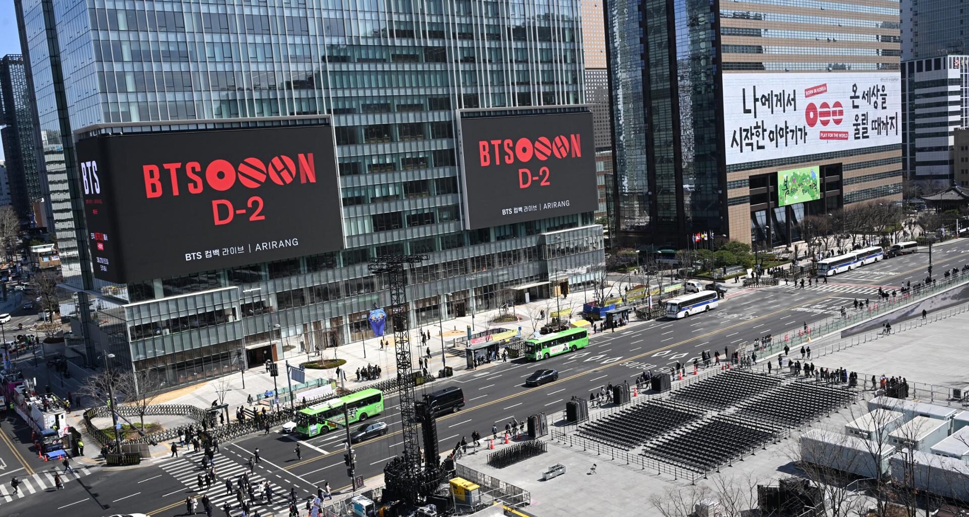 Signboards in front of Gwanghwamun Square display a countdown to K-pop group BTS