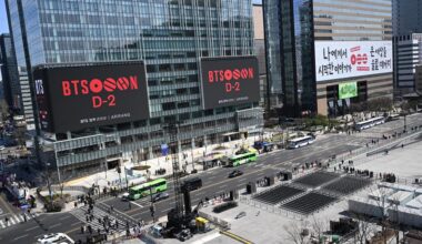 Signboards in front of Gwanghwamun Square display a countdown to K-pop group BTS