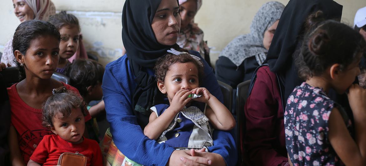 Children who are not getting enough to eat attend a nutrition clinic in Deir al Balah, in Gaza.