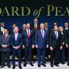 President Trump, flanked by Vice President JD Vance and Secretary of State Marco Rubio, joins leaders for a group photo during the inaugural meeting of the Board of Peace in Washington on Thursday.
