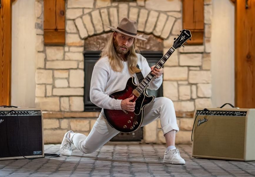 St. Thomas, Ont., musician Justin Maki with his guitar