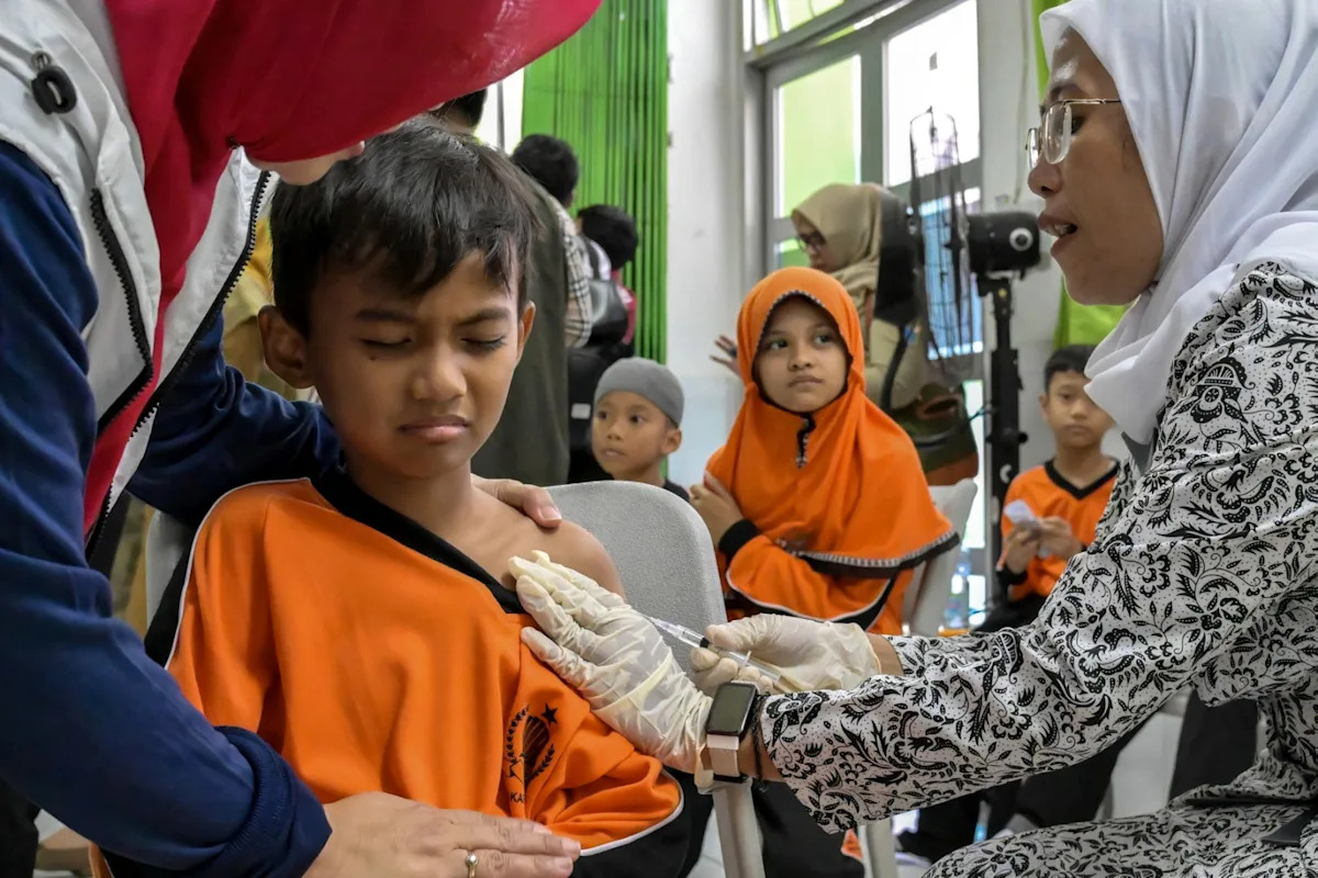 Experts refute 'natural' immunity claims as Indonesia battles measles outbreak