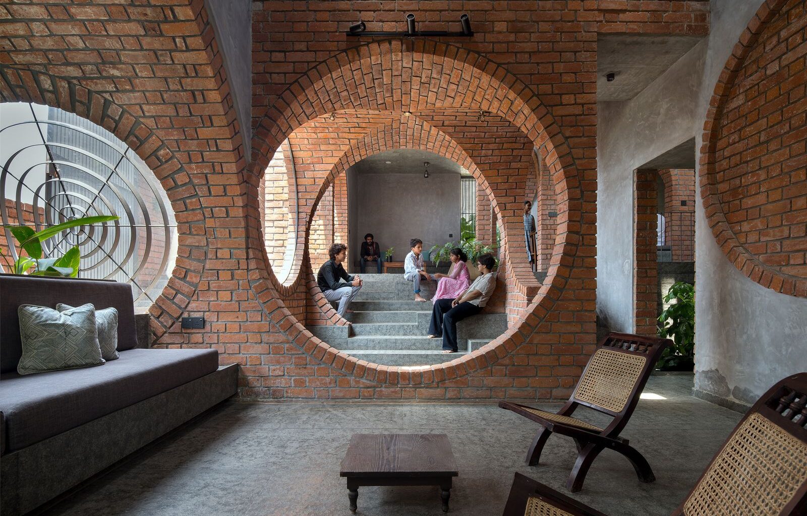 Brick Portals Channel Light and Air in This Multigenerational Home in India