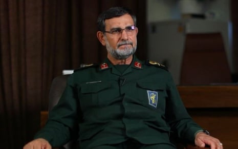 Alireza Tangsiri seated in military uniform. 