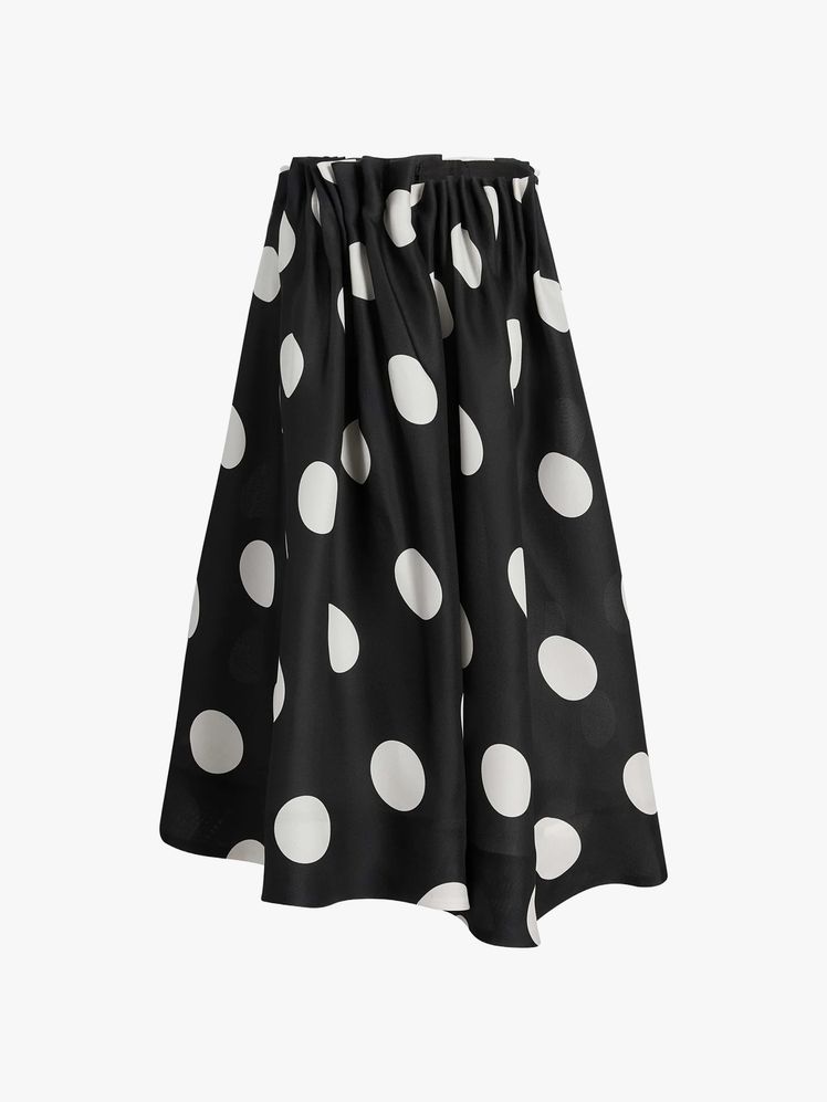 Image may contain: Clothing, Skirt, Pattern, and Coat