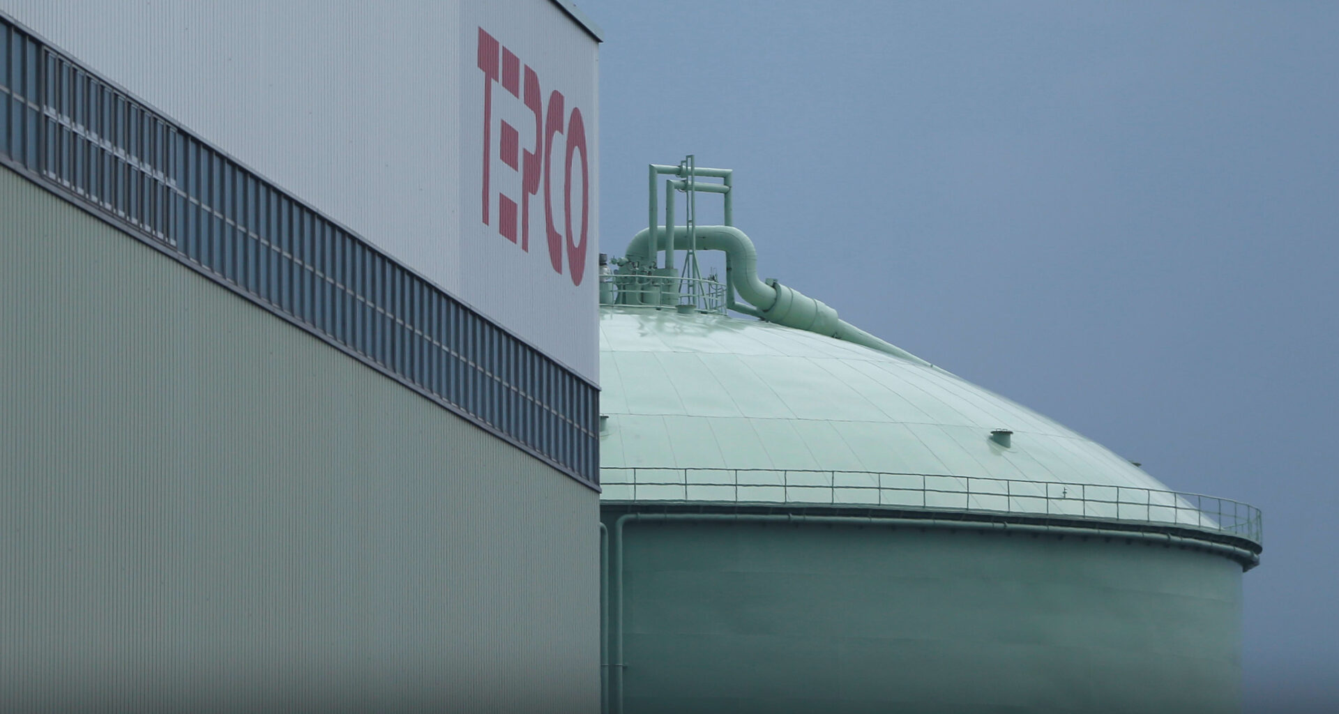 Palestinians sell bread on a street beneath a destroyed building in Gaza City's Zawiya market on February 18, 2026, on the first days of the holy fasting month of Ramadan.