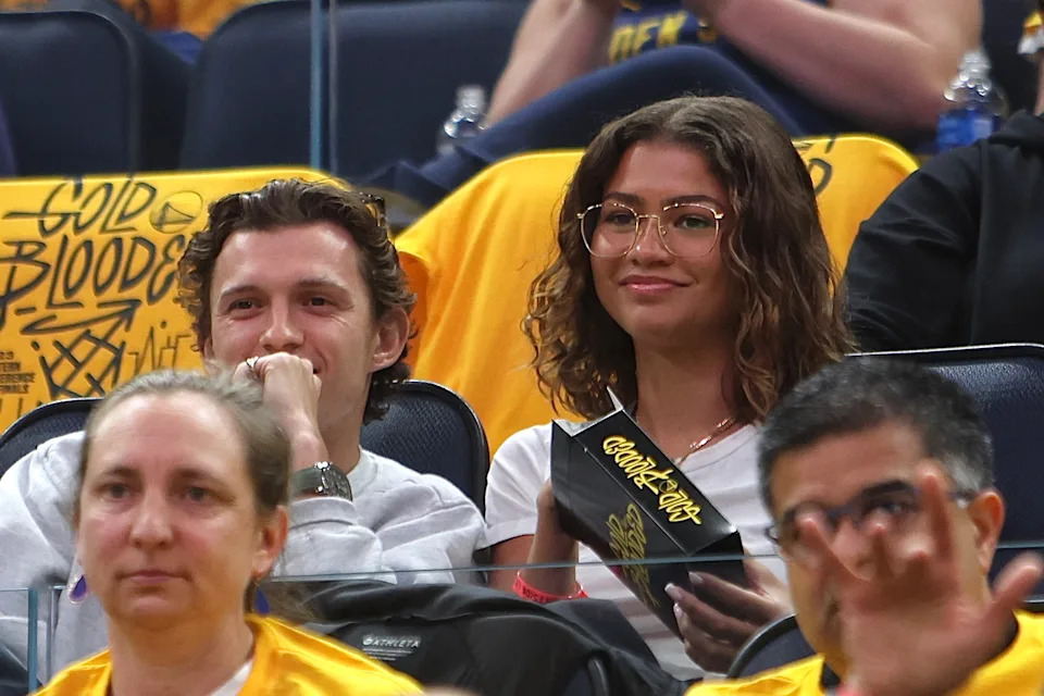 Tom Holland and Zendaya watch the game between the Los Angeles Lakers and Golden State Warriors during Game 2 of the 2023 NBA Playoffs Western Conference Semifinals on May 4, 2023.