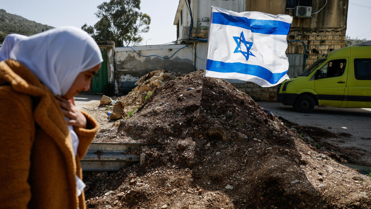 West Bank settler violence surges as Israeli strikes on Gaza kill four Palestinians