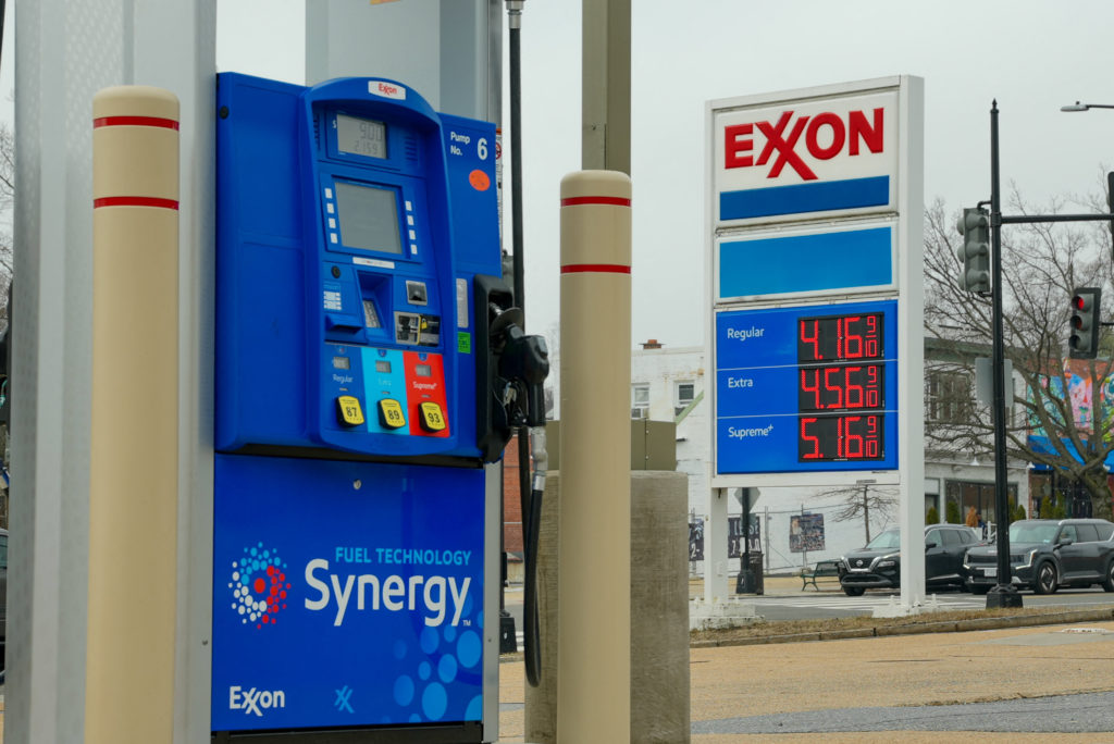 Gas prices are seen at a fuelling station as the price of oil and gas has surged amid the U.S.-Israeli conflict with Iran,...