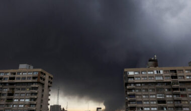 Smoke rises after a reported strike on fuel tanks at an oil refinery, amid the U.S.-Israeli conflict with Iran, in Tehran