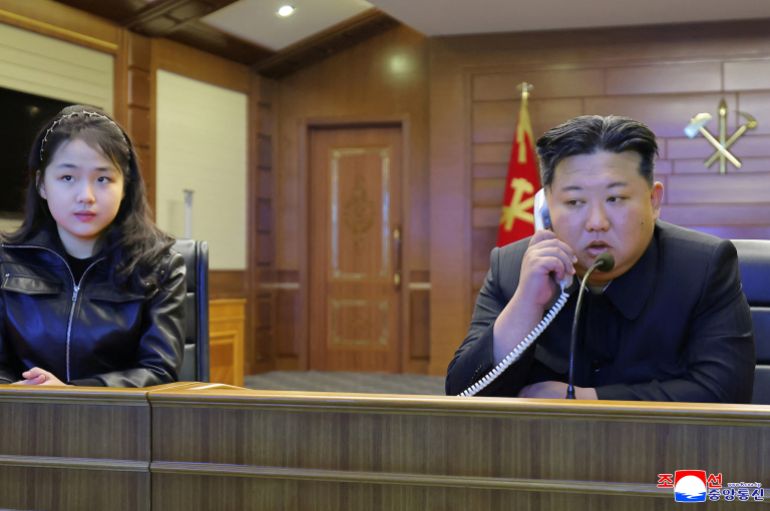 North Korean leader Kim Jong Un and his daughter Kim Ju Ae observe a missile test launch conducted by the Choe Hyon naval destroyer at an unknown location in North Korea, March 10, 2026, in this picture released March 11, 2026 by North Korea's official Korean Central News Agency. KCNA via REUTERS ATTENTION EDITORS - THIS IMAGE WAS PROVIDED BY A THIRD PARTY. REUTERS IS UNABLE TO INDEPENDENTLY VERIFY THIS IMAGE. NO THIRD PARTY SALES. SOUTH KOREA OUT. NO COMMERCIAL OR EDITORIAL SALES IN SOUTH KOREA.