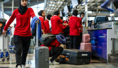 Members of the Iranian women’s national soccer team arrive at Kuala Lumpur International Airport