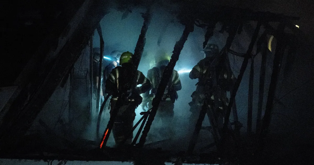 Dozens evacuated after Iranian missile sets building on fire in central Israel - Haaretz