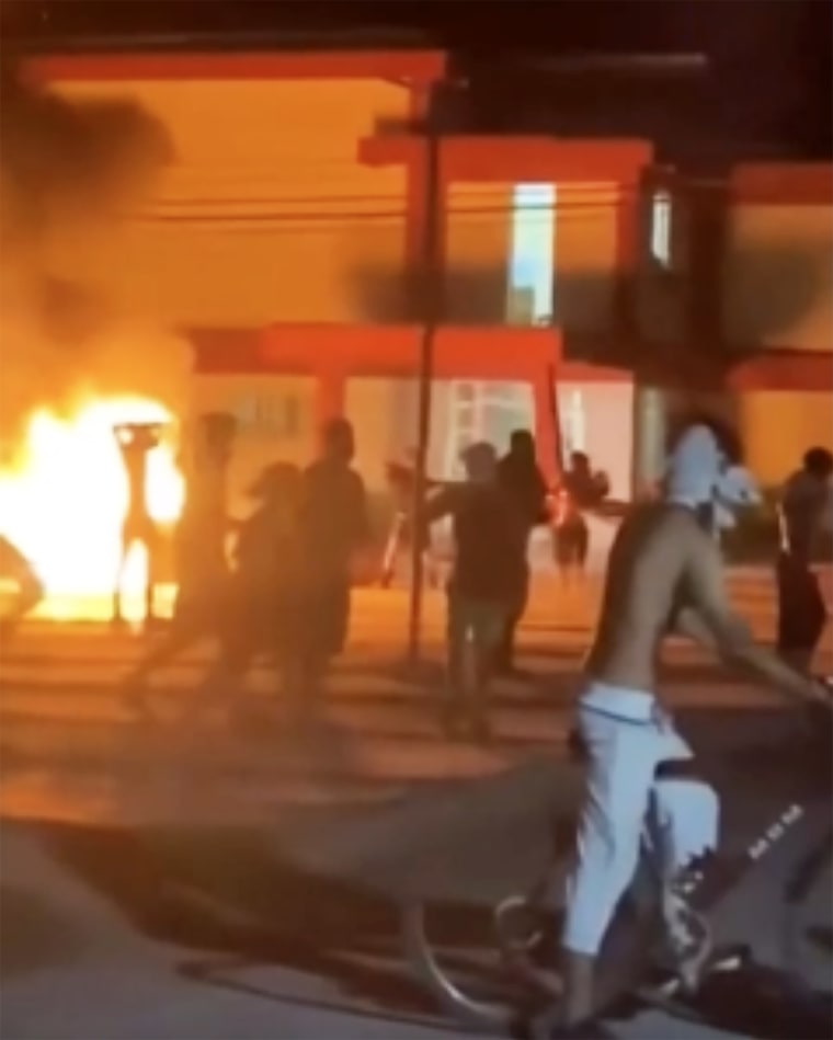 Anti-government protesters outside a Communist Party office in Moron, northern Cuba, early Saturday.