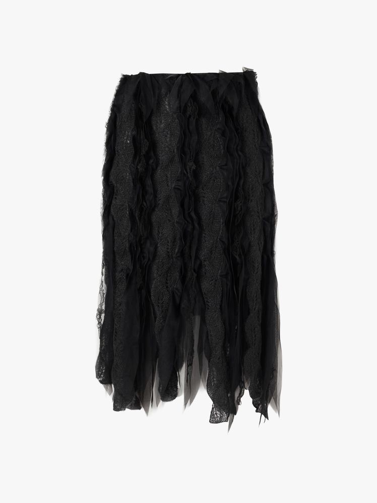 Image may contain: Clothing, Skirt, Coat, and Miniskirt