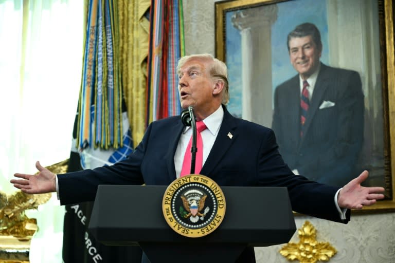 Donald Trump said 'we're dealing with the right people' amid hopes for a de-escalation in the war (Jim WATSON)