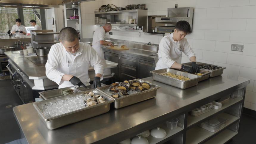 Chef-owner Corey Lee (left) in the kitchen of Benu, San Francisco.